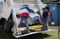 Garbage is transported in garbage trucks.