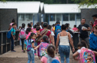 Children affected by the volcanic eruption of June 3, 2018, beginning their school day in the shelter of the La Industria farm, Escuintla of the Republic of Guatemala.